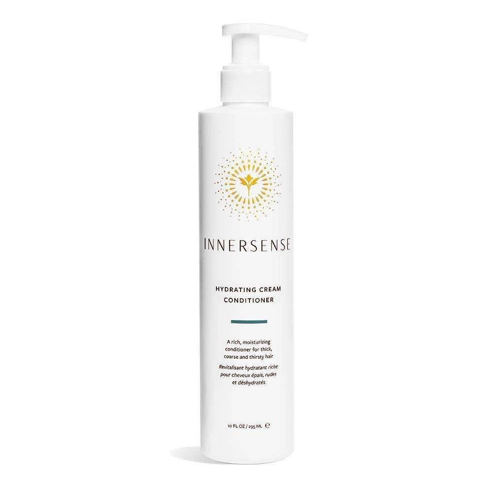 White Innersense Hydrating Cream Conditioner pump bottle with gold sunburst logo and black text.