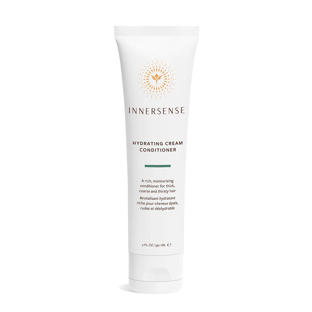 White Innersense Hydrating Cream Conditioner tube with gold sunburst logo and text.