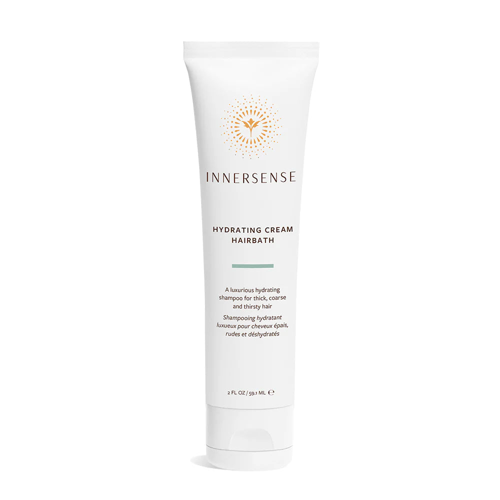 White Innersense Hydrating Cream Hairbath tube with gold sun logo and product details.