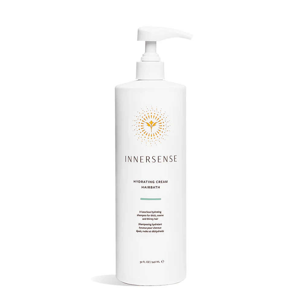 Large white Innersense Hydrating Cream Hairbath pump bottle with gold sun logo.
