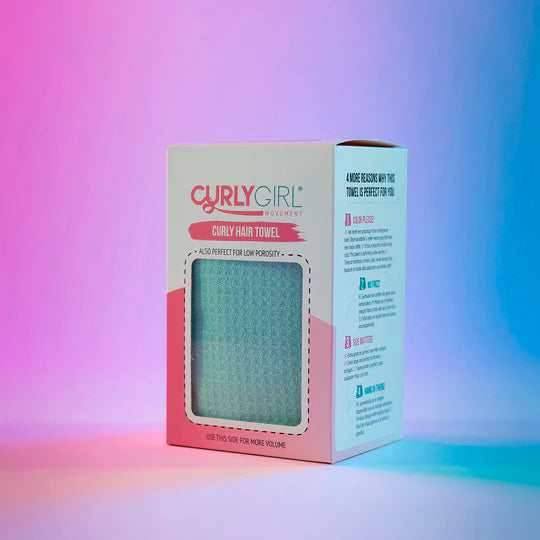 Curly Girl Movement Curly Hair Towel in white and pink packaging with a visible light blue waffle-textured towel.