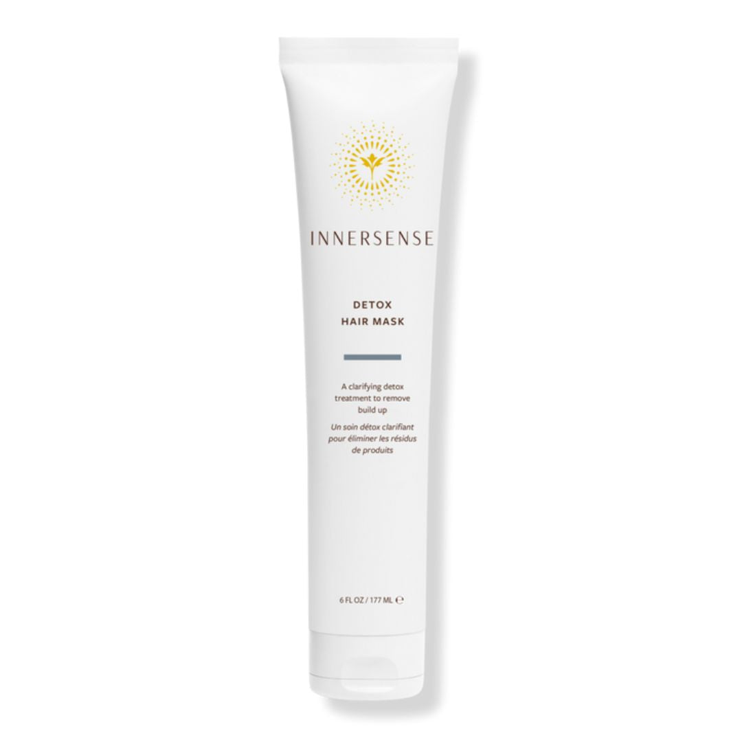 White Innersense Detox Hair Mask tube with gold sunburst logo and product details.