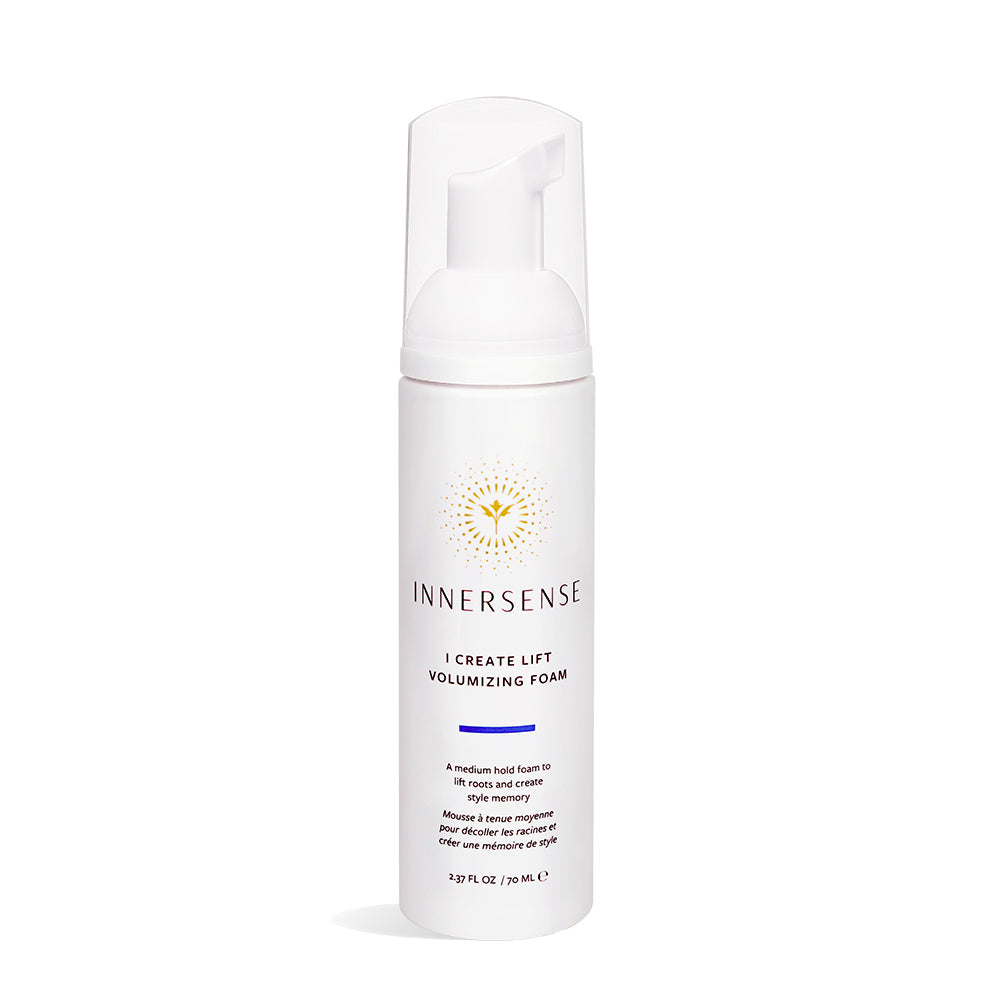 White Innersense I Create Lift Volumizing Foam bottle with clear pump top and gold sun logo.