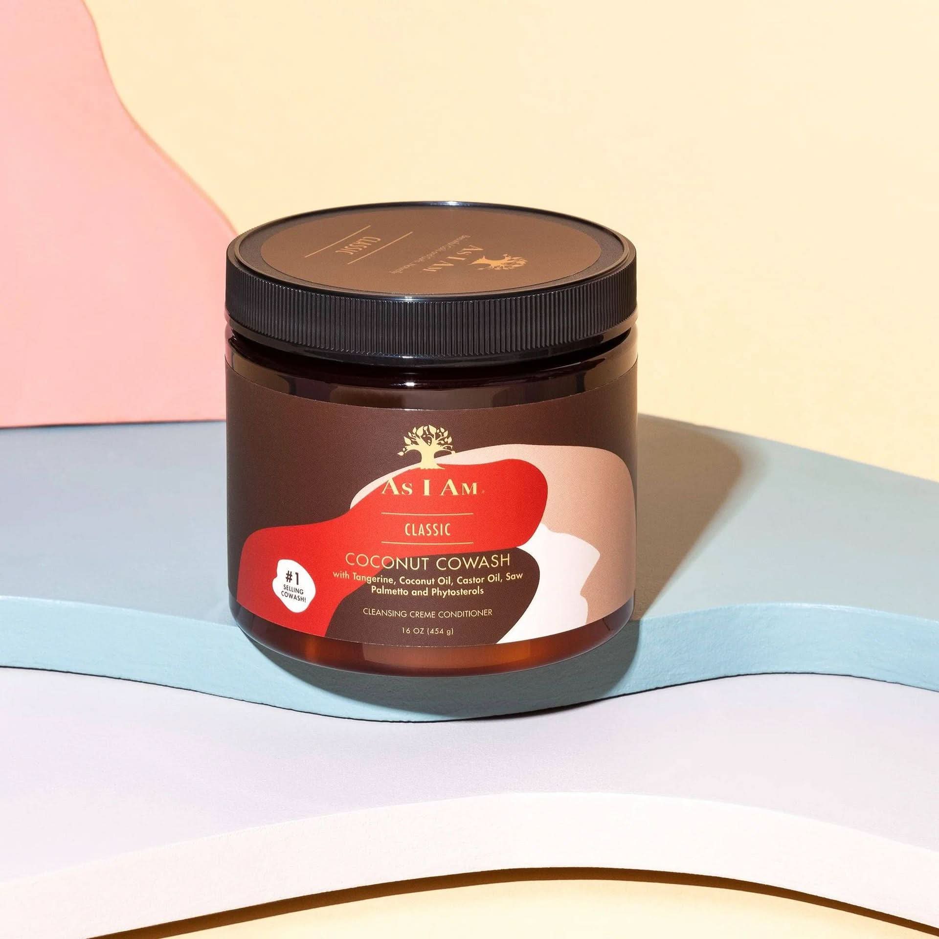 As I Am Classic Coconut Co-Wash 16oz in a brown jar with a black lid, on a colorful background.