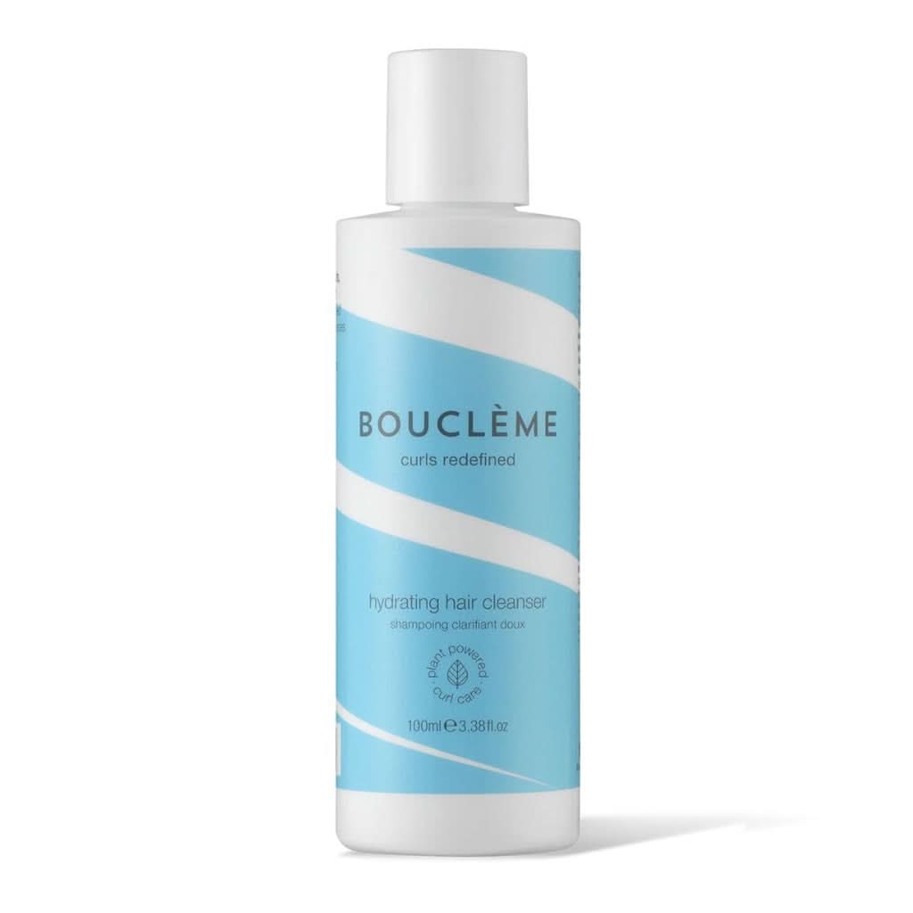 Bouclème Hydrating Hair Cleanser in a white 100ml bottle with light blue diagonal stripes.