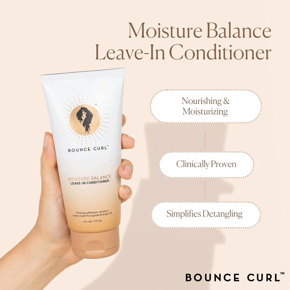 Hand holding a white and beige Bounce Curl Moisture Balance Leave-In Conditioner tube, 177ml.