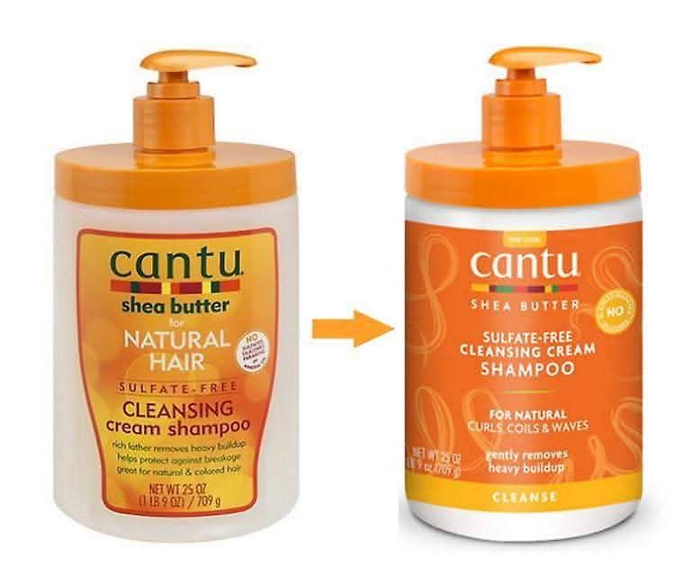 Two white Cantu Shea Butter Cleansing Cream Shampoo bottles with orange pump tops and labels.