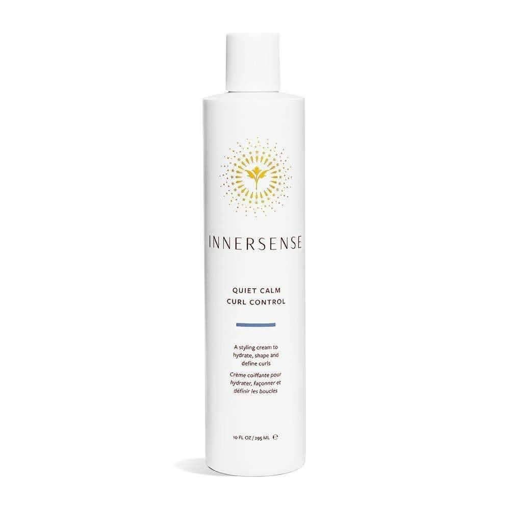 White Innersense Quiet Calm Curl Control bottle with gold sunburst logo.