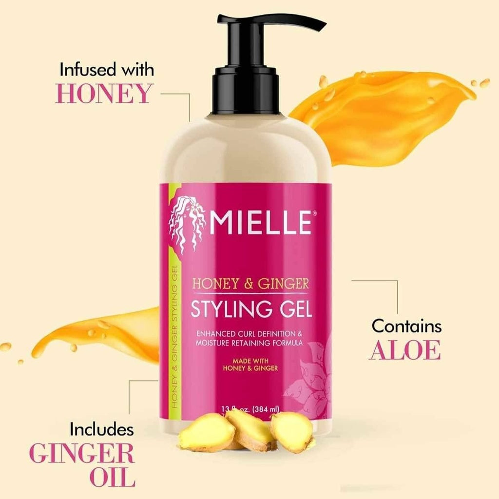 Mielle Honey & Ginger Styling Gel in a clear 384ml pump bottle with pink label, surrounded by honey, ginger, and aloe.