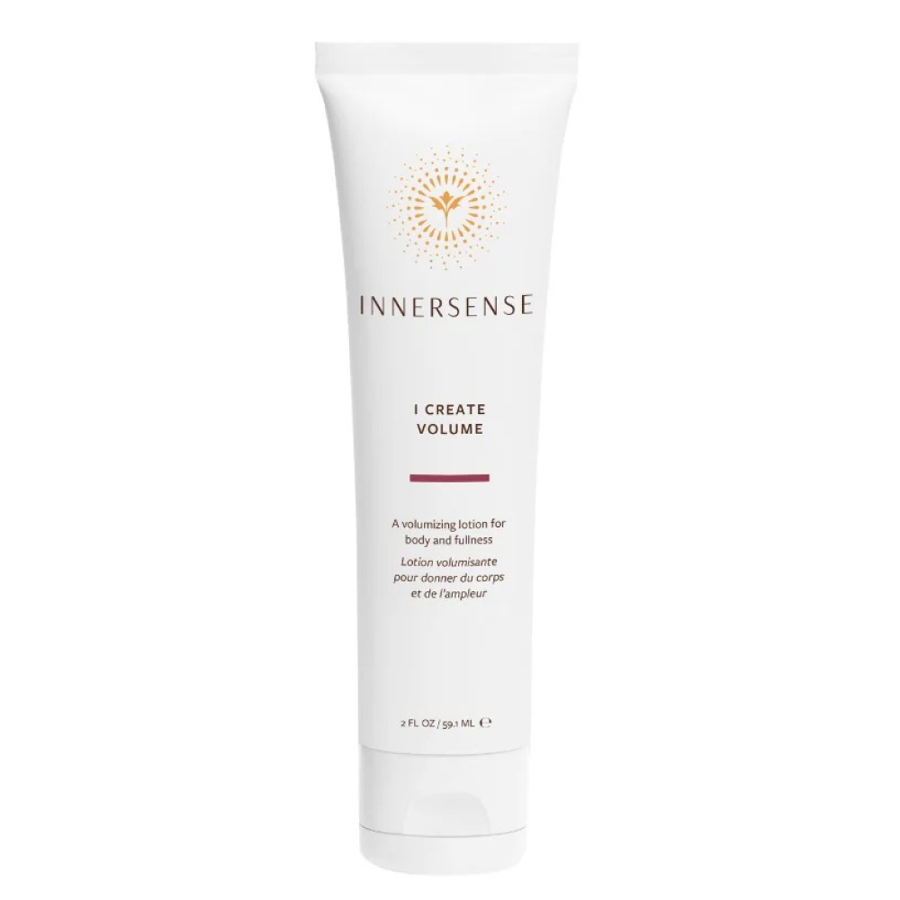 White Innersense I Create Volume styling lotion tube with gold sun logo and brown text.