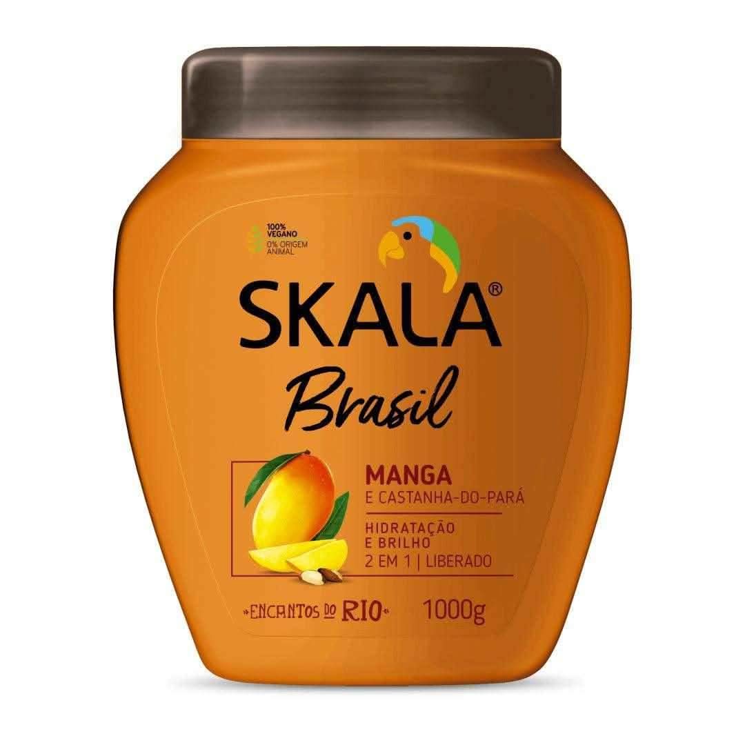 Orange Skala Brasil 1000g treatment cream with mango and chestnut of Pará, brown lid, and parrot logo.