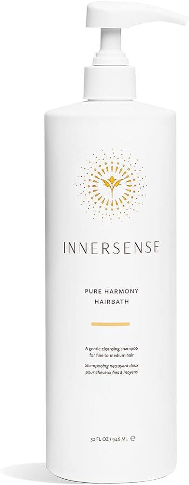 White Innersense Pure Harmony Hairbath shampoo bottle with gold sunburst logo and pump dispenser.