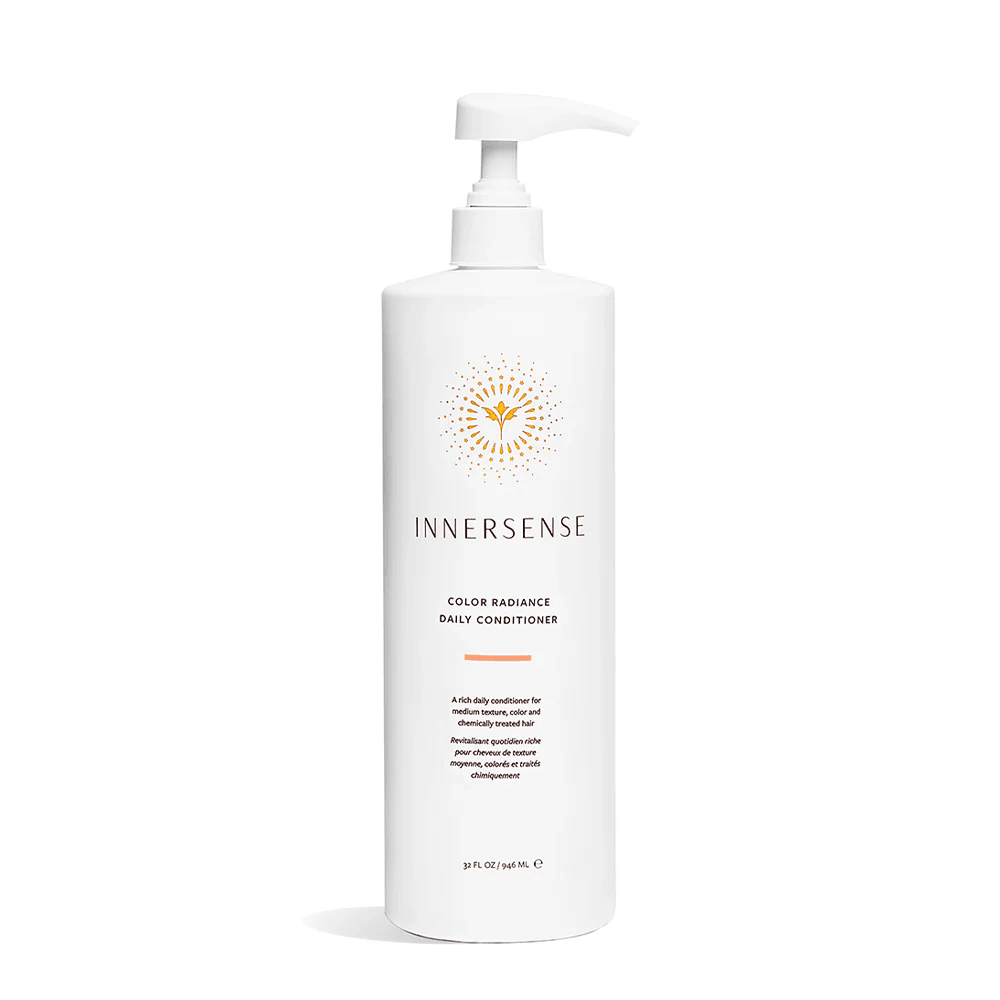 White Innersense Color Radiance Daily Conditioner 32 fl oz pump bottle with orange sunburst logo.