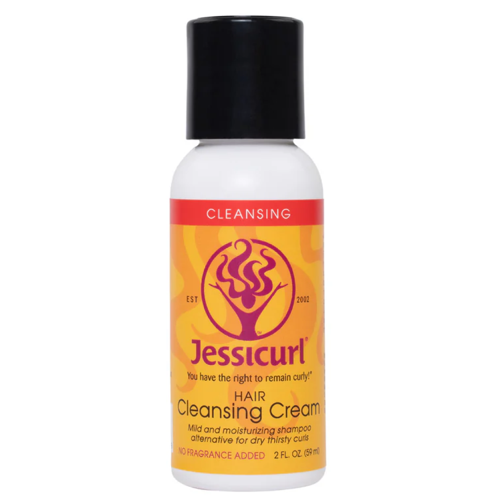 Jessicurl Hair Cleansing Cream in a white bottle with a black cap and orange label.
