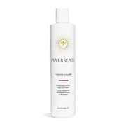 White Innersense I Create Volume styling lotion bottle with gold sunburst logo.