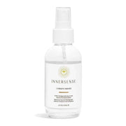 Innersense I Create Waves texturizing spray in a clear 4 fl oz bottle with a white pump and label.