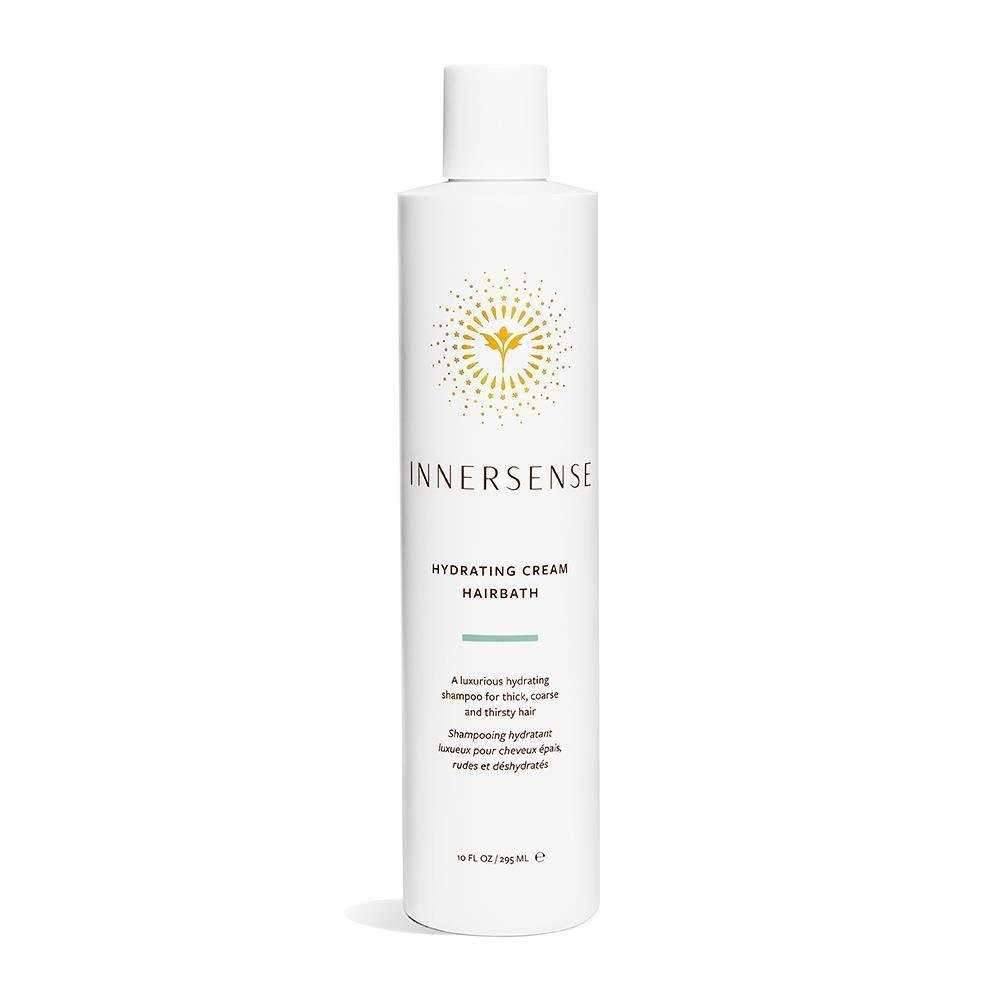 White Innersense Hydrating Cream Hairbath bottle with gold sunburst logo and black text.